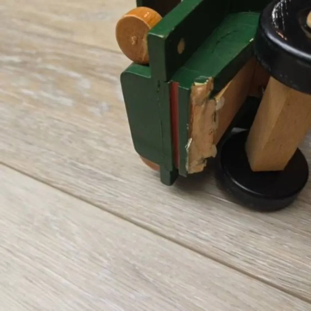 2 vintage Romania toy wooden trucks colorful, moving parts collectible
